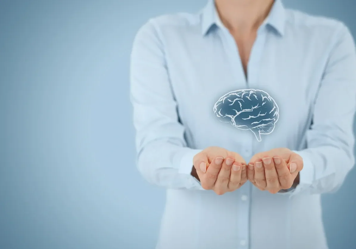 Person presenting holographic brain model