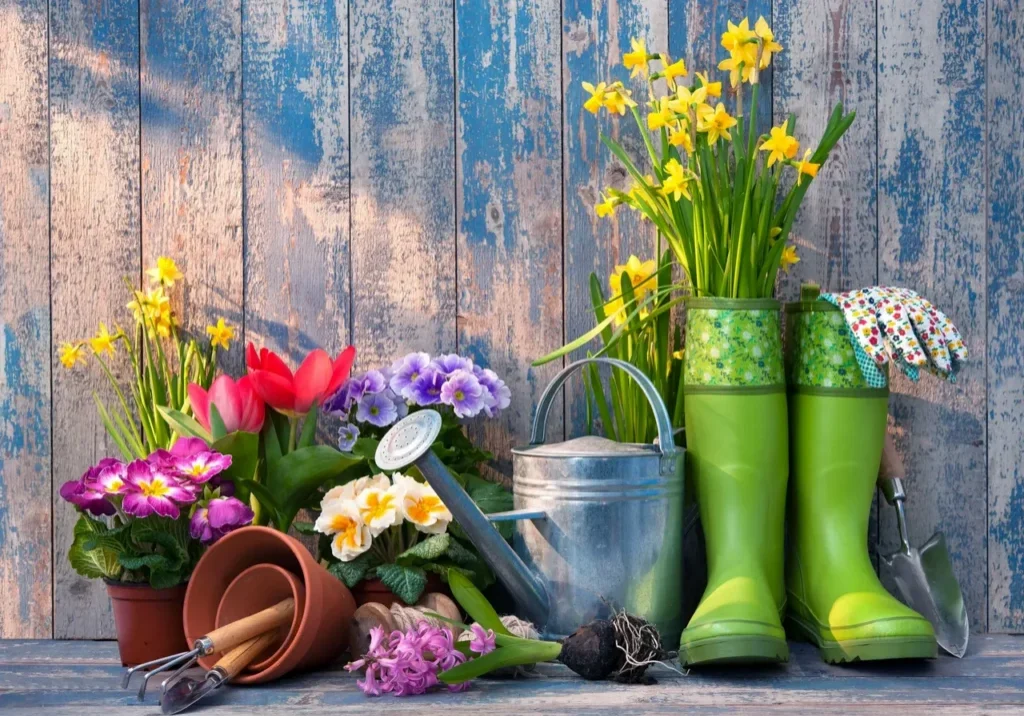 Green boots with daffodils and tulips